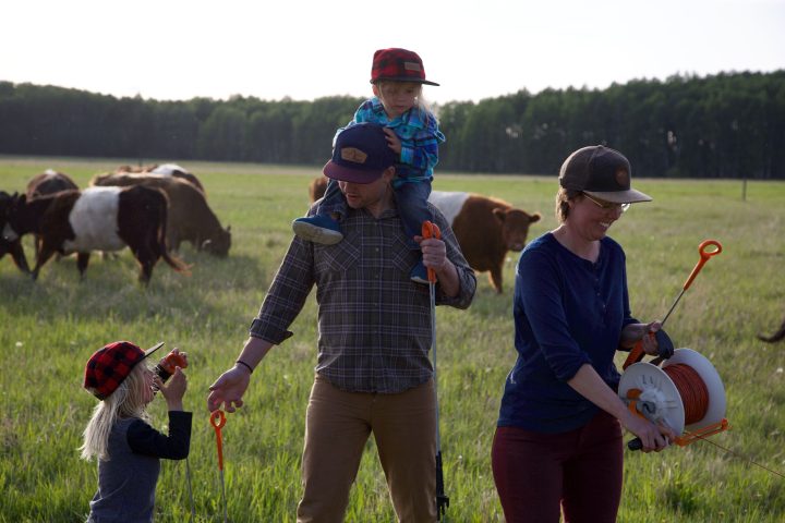 Kitt family walking through field
