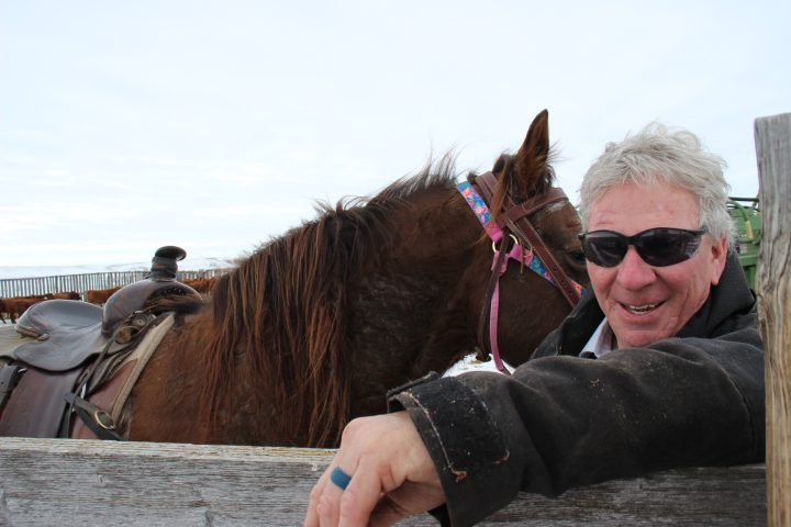 Mike Hart with horse - Hart Ranches